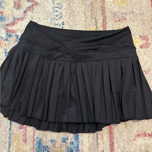 Black gold hinge skirt